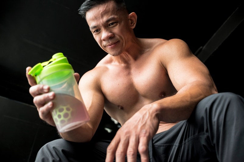 Man with pre-workout drink.